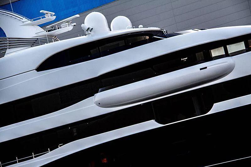 a white and black train aboard SYMPHONY Yacht for Sale