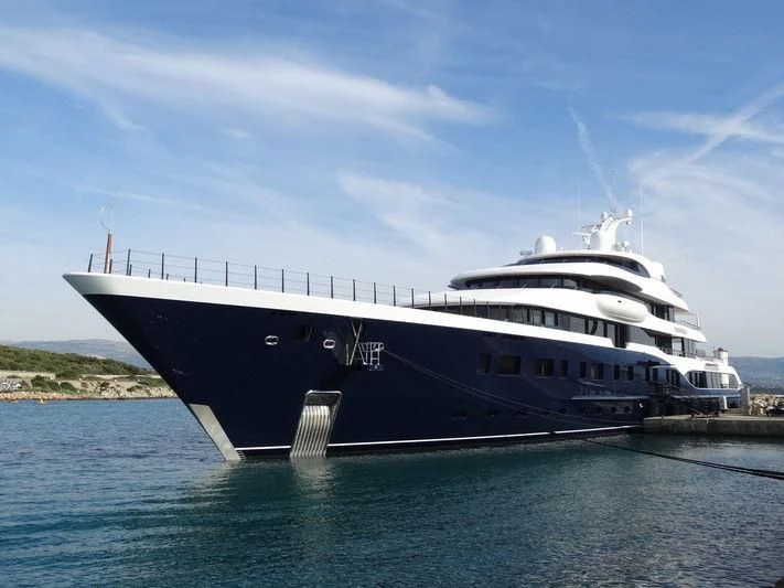 a large white ship in the water aboard SYMPHONY Yacht for Sale