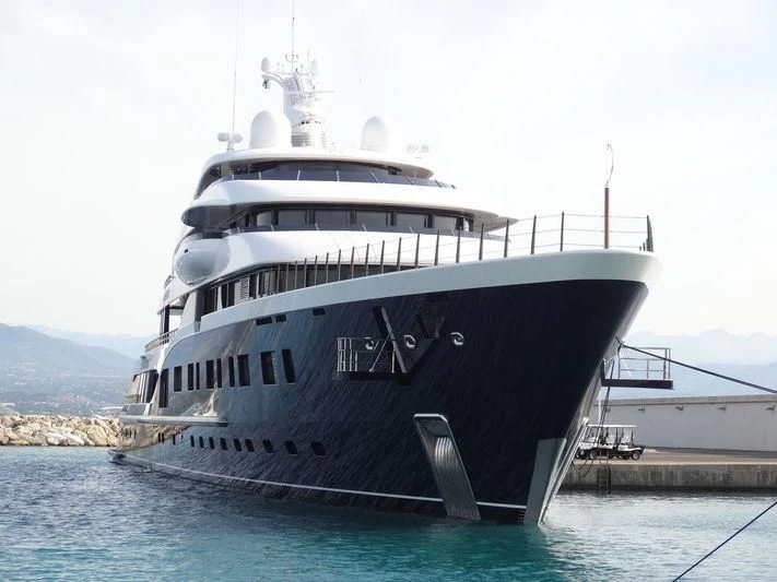 a large ship in the water aboard SYMPHONY Yacht for Sale