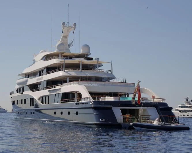a large white boat in the water aboard SYMPHONY Yacht for Sale