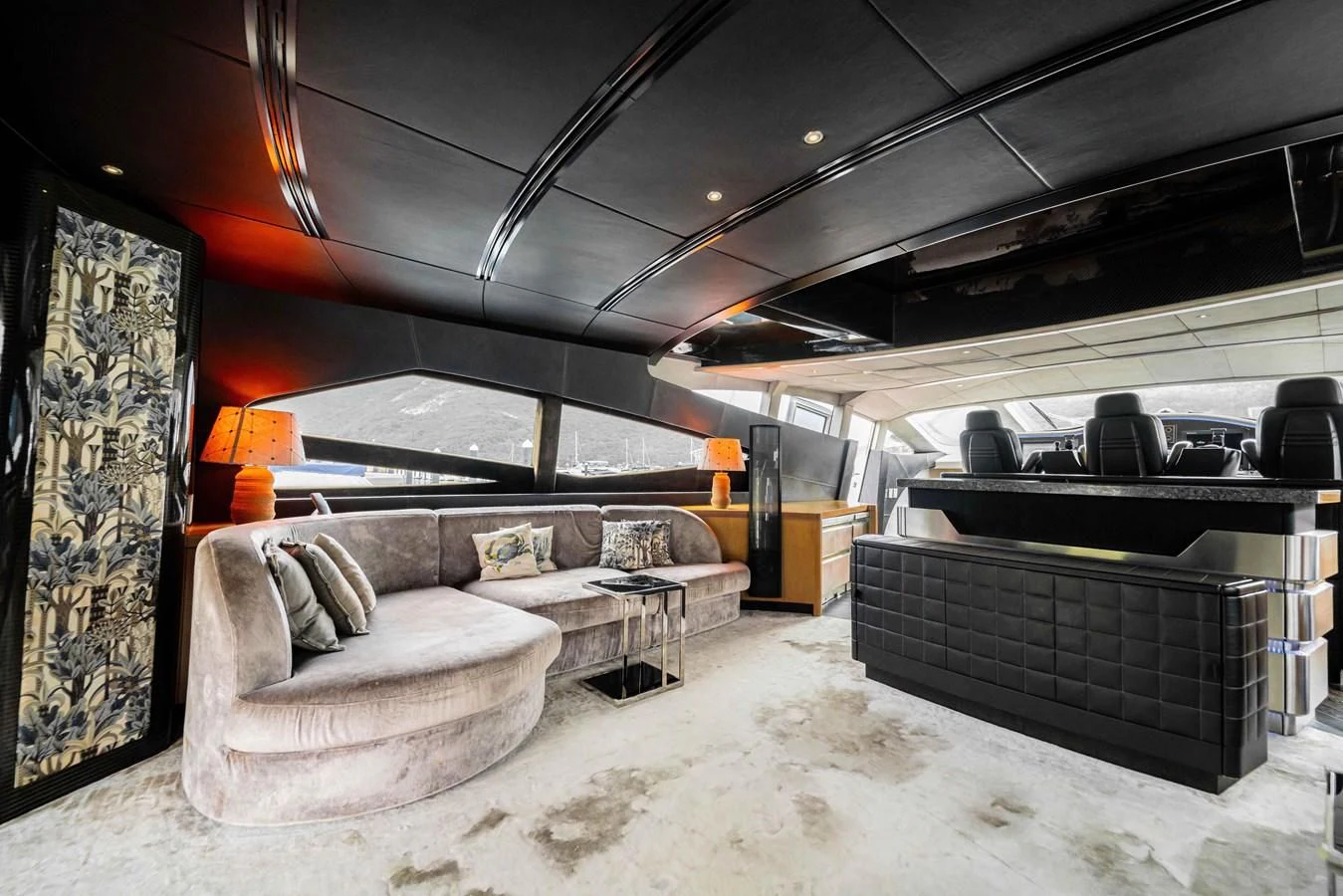 a living room with a couch and a fireplace aboard SORAYA Yacht for Sale