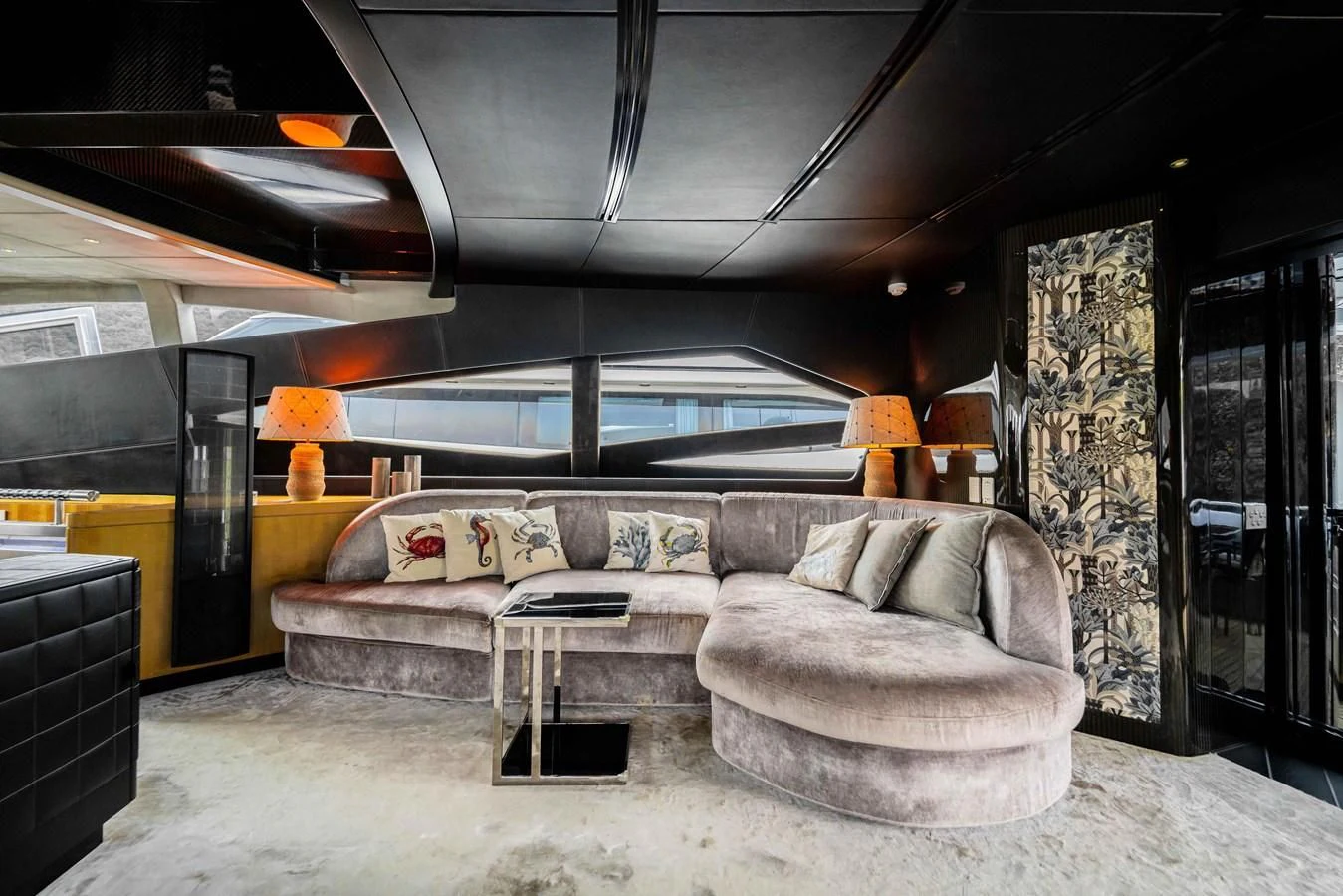 a living room with a couch and a tv aboard SORAYA Yacht for Sale