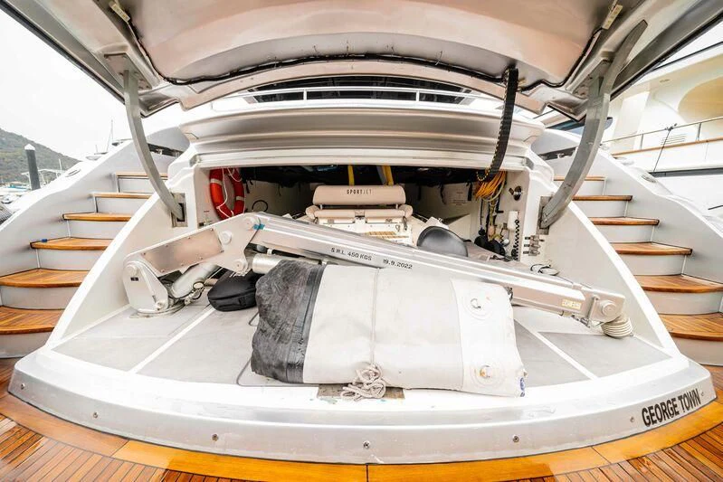 a white boat with a black stripe aboard SORAYA Yacht for Sale