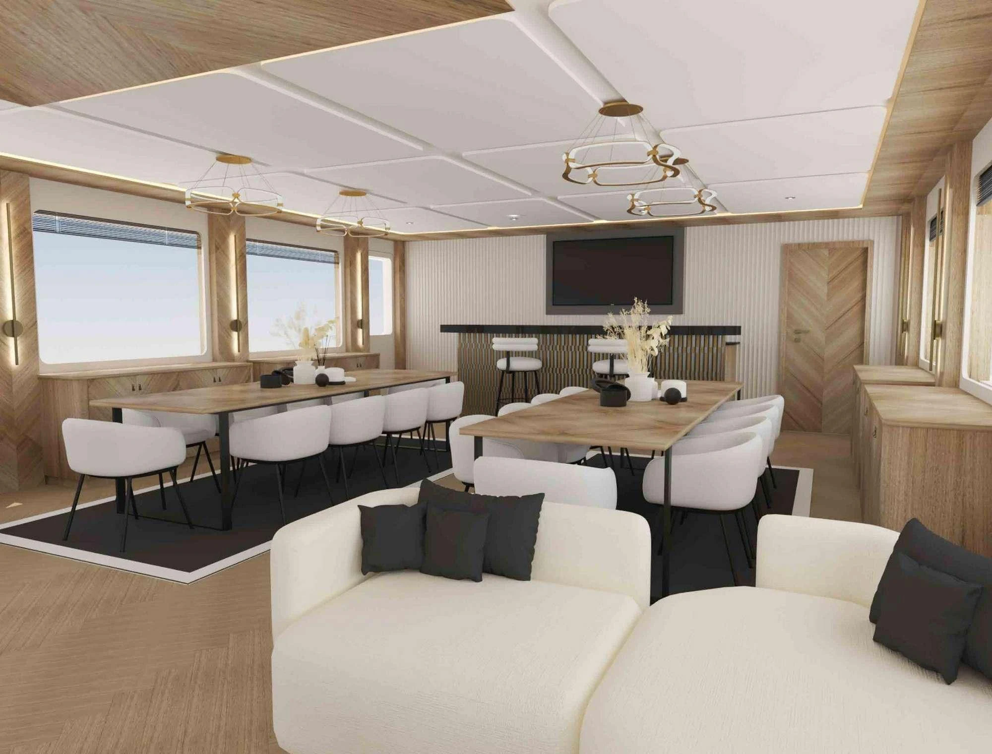 a room with tables and chairs aboard KING OF THE SEA Yacht for Charter