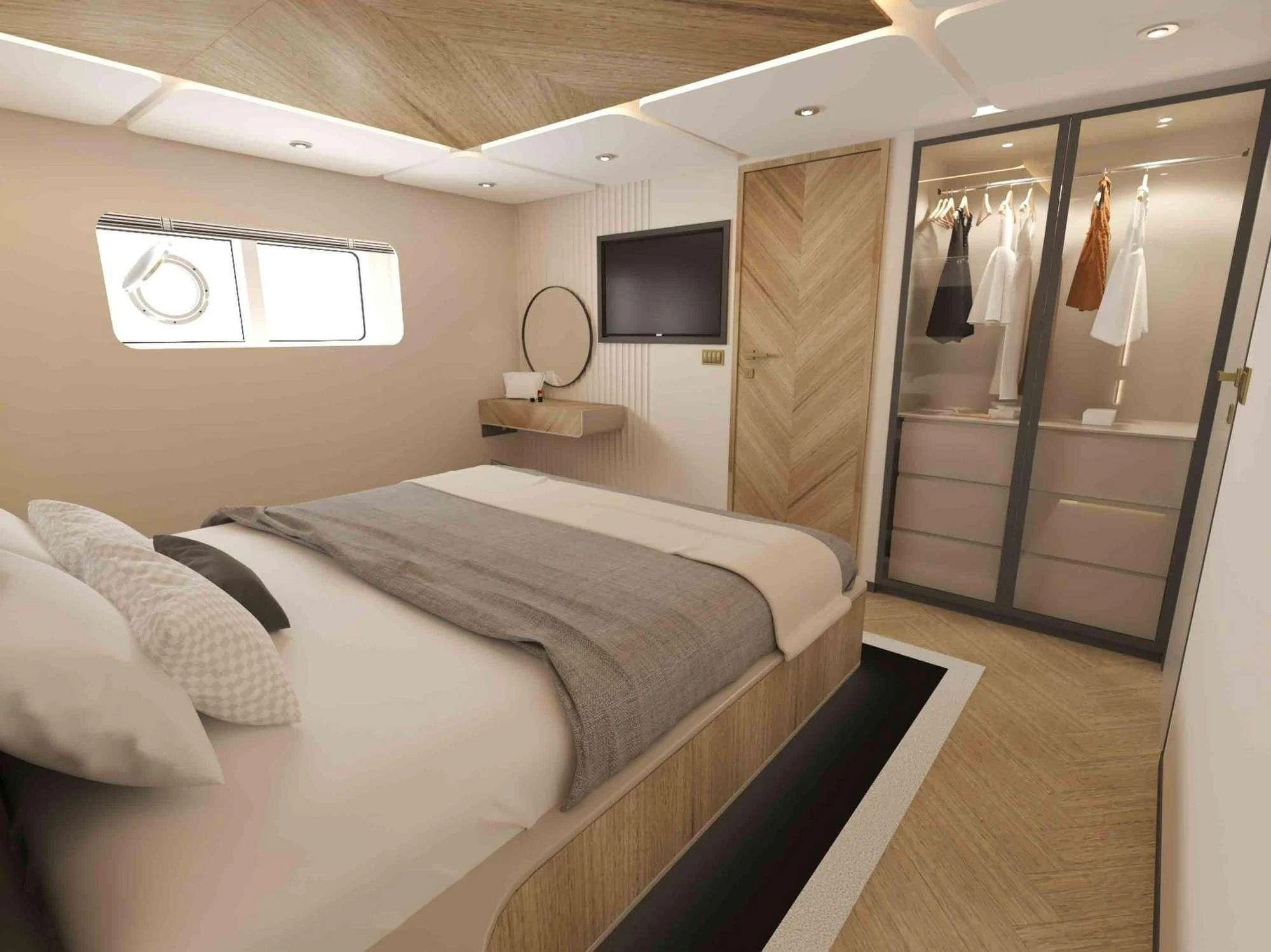 a bedroom with a bed and a television aboard KING OF THE SEA Yacht for Charter