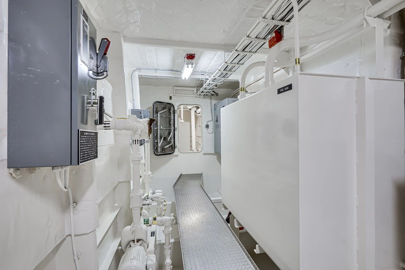 a room with white pipes aboard DRAGONFLY Yacht for Sale