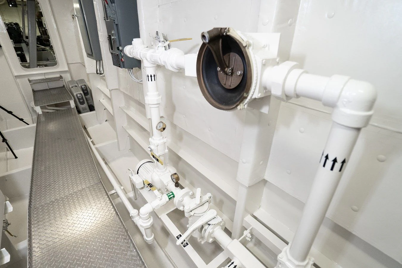 a white machine with a large round metal object on it aboard DRAGONFLY Yacht for Sale