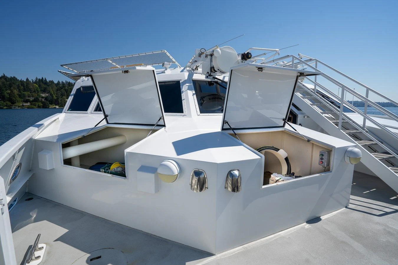 a boat on a dock aboard DRAGONFLY Yacht for Sale