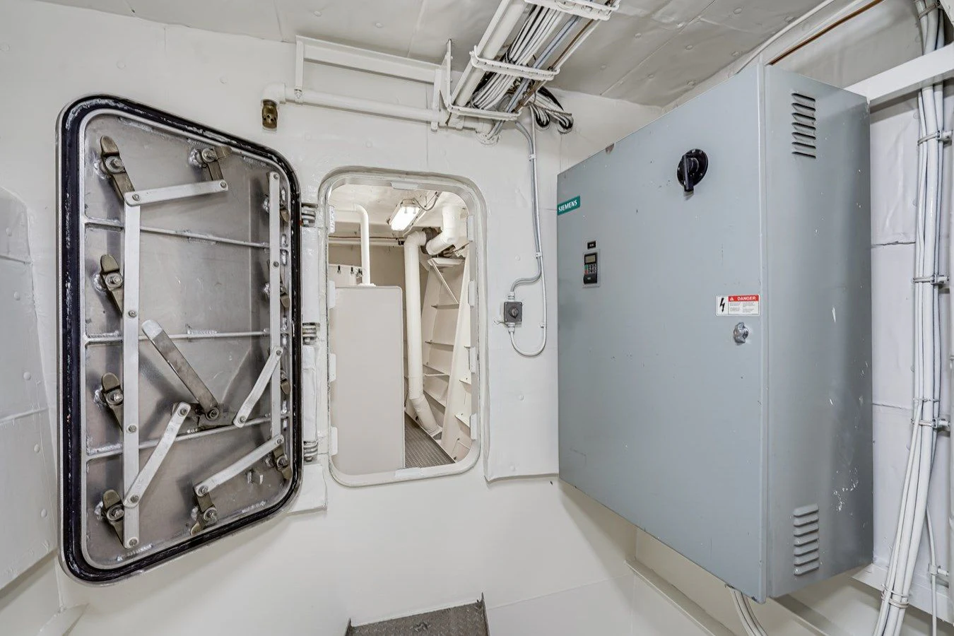 a room with white machines aboard DRAGONFLY Yacht for Sale