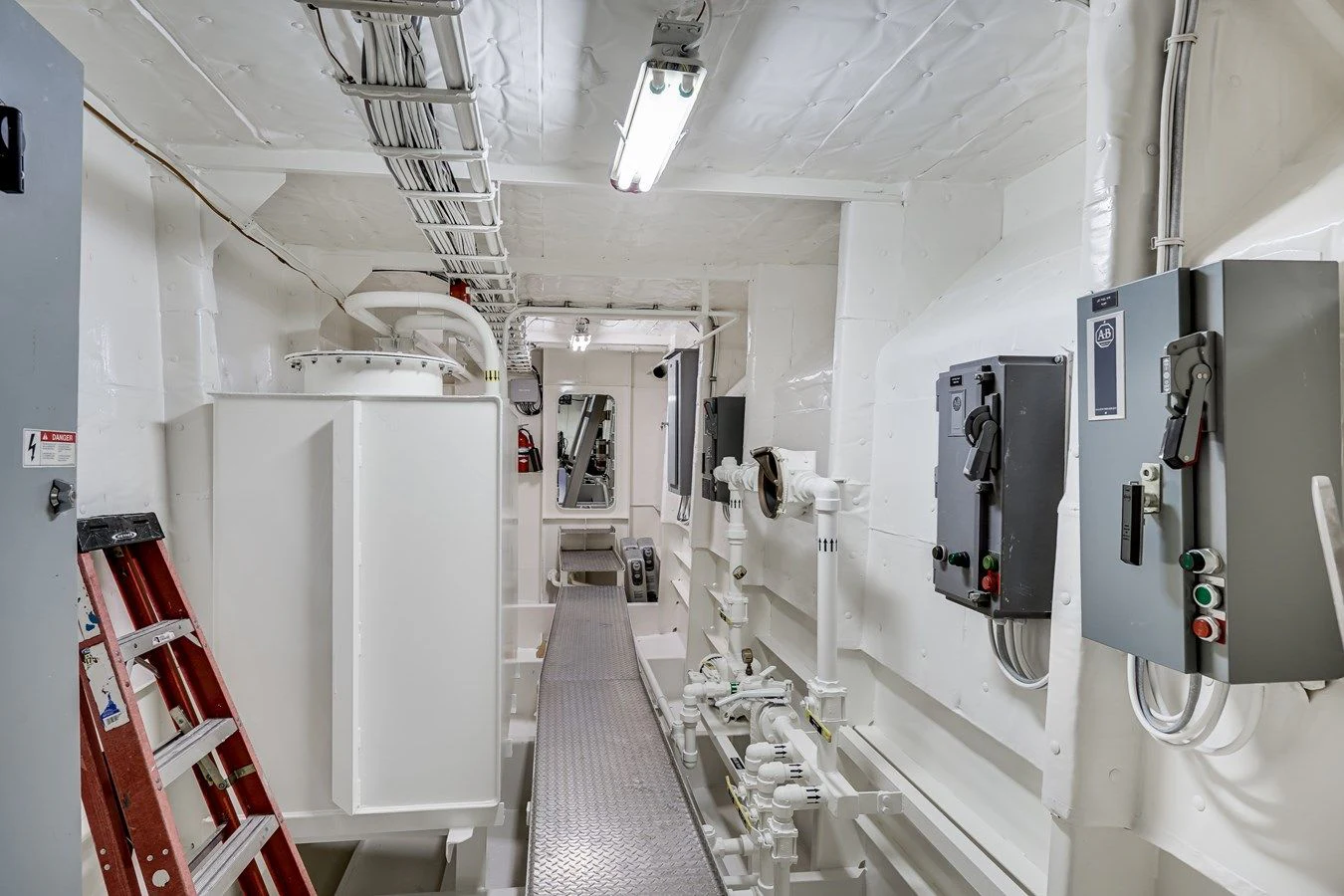 a room with white machines aboard DRAGONFLY Yacht for Sale