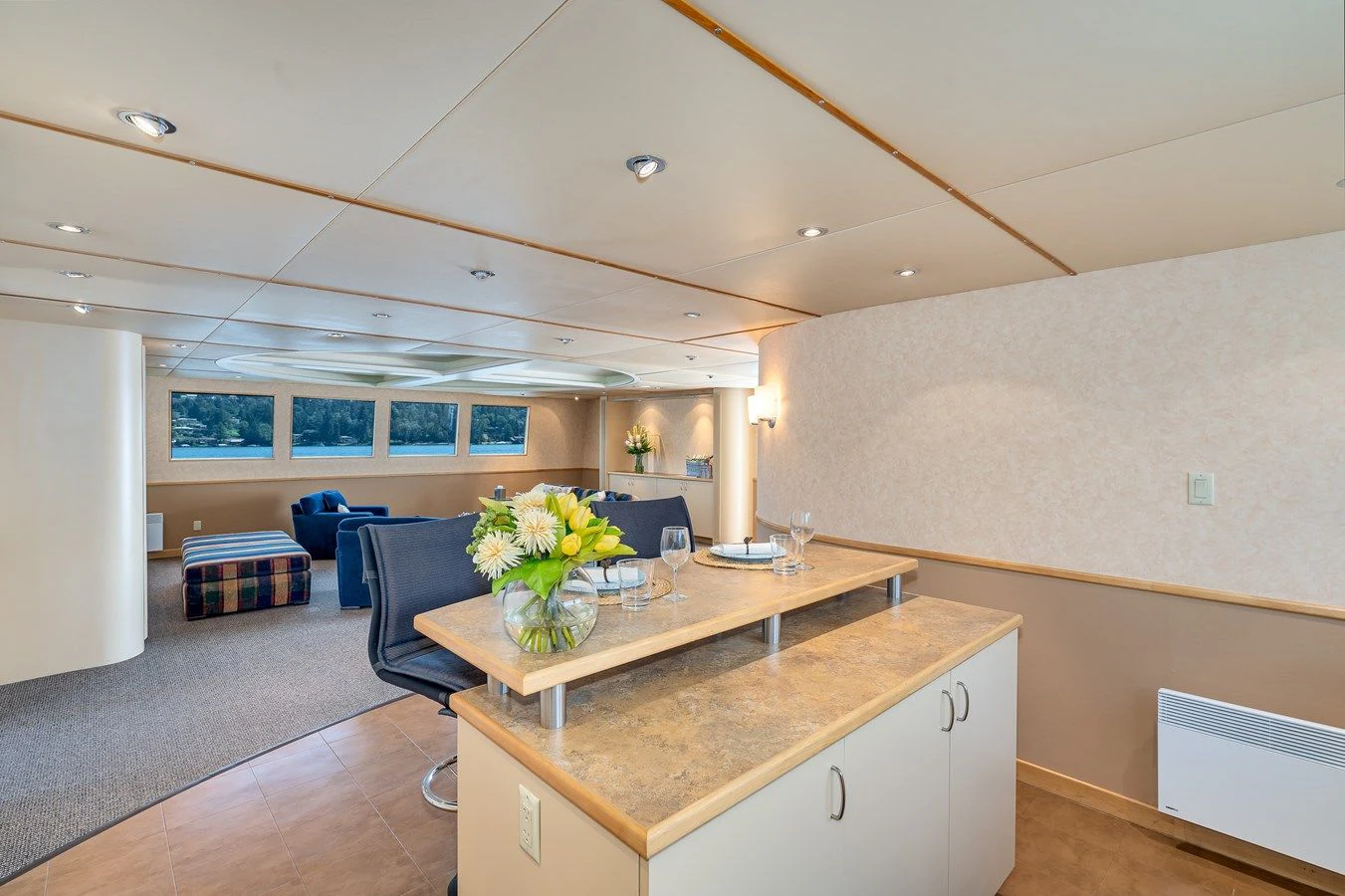a kitchen and dining area aboard DRAGONFLY Yacht for Sale