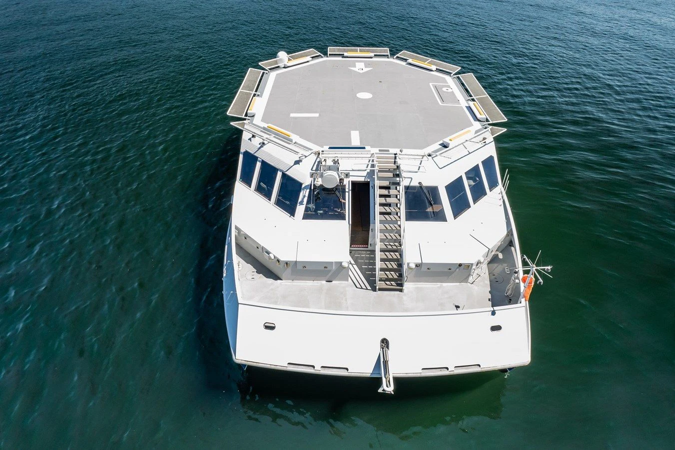 a boat in the water aboard DRAGONFLY Yacht for Sale