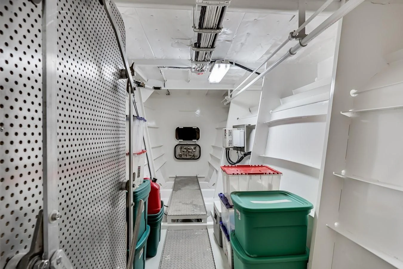 a room with a machine and a bucket aboard DRAGONFLY Yacht for Sale