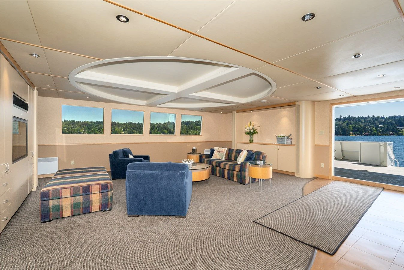 a large living room with a large open floor plan aboard DRAGONFLY Yacht for Sale