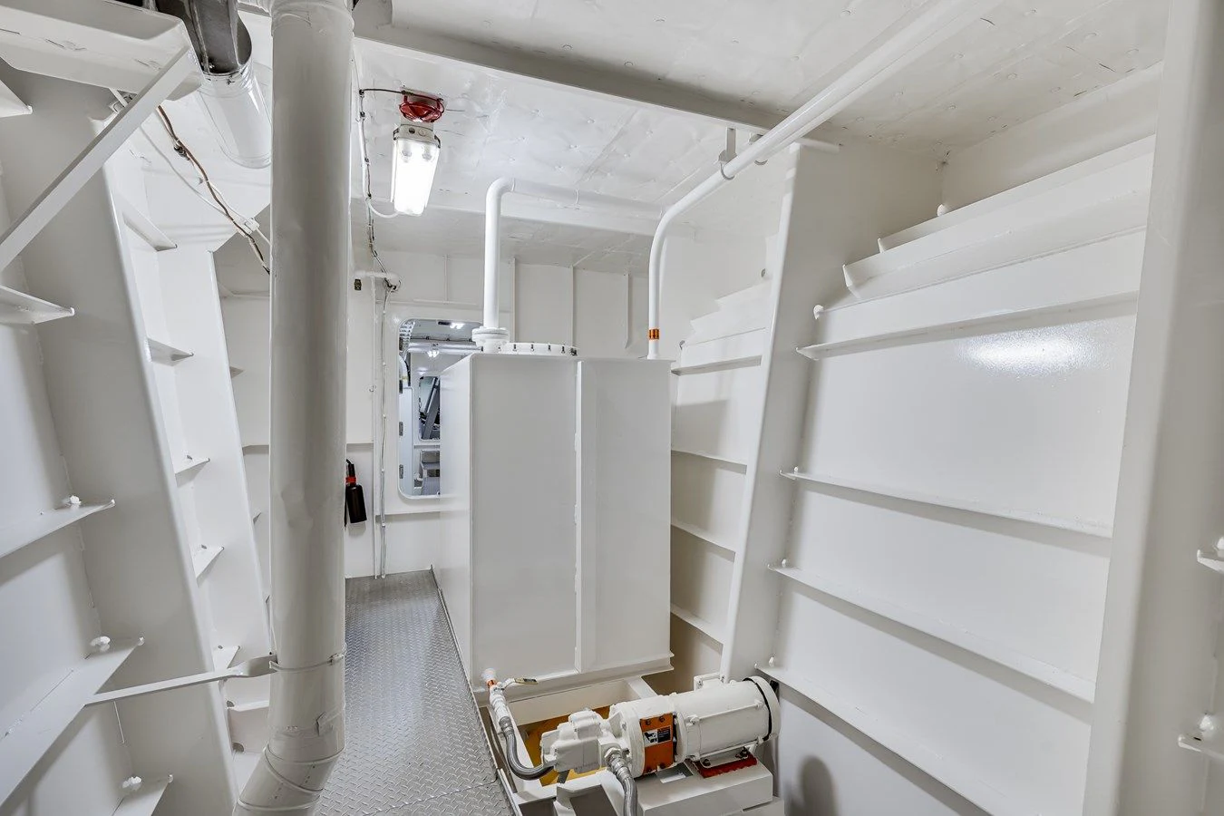 a room with white shelves aboard DRAGONFLY Yacht for Sale