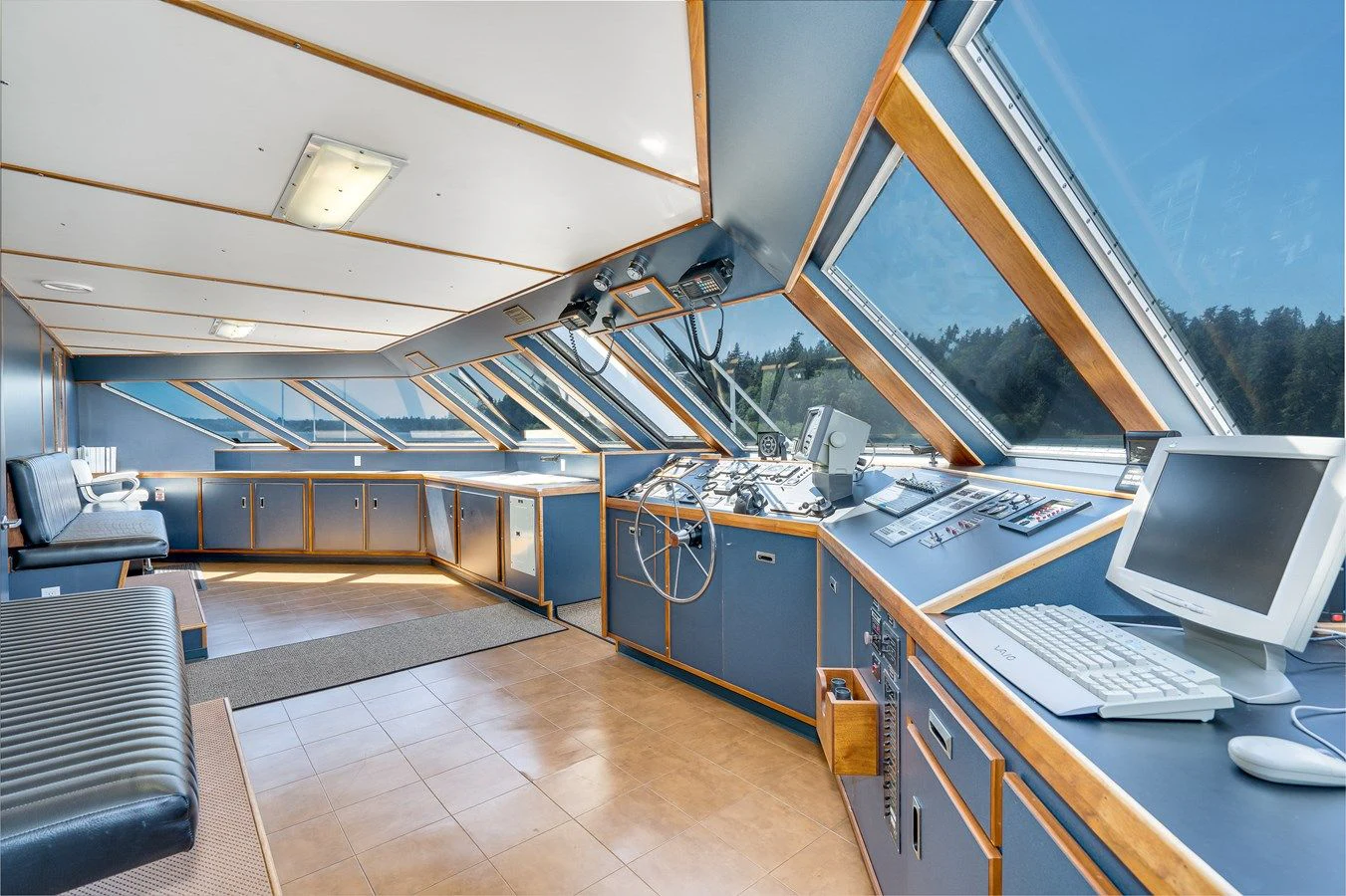 a room with a large glass window aboard DRAGONFLY Yacht for Sale