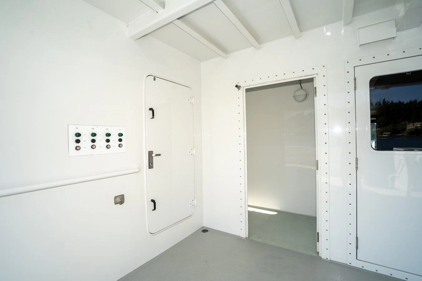 a room with white cabinets aboard DRAGONFLY Yacht for Sale