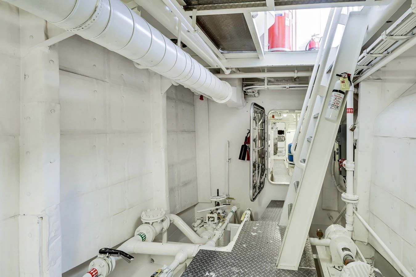 a room with pipes and equipment aboard DRAGONFLY Yacht for Sale