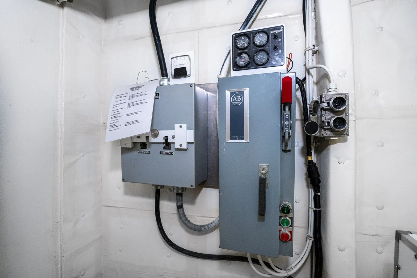 a machine on the wall aboard DRAGONFLY Yacht for Sale