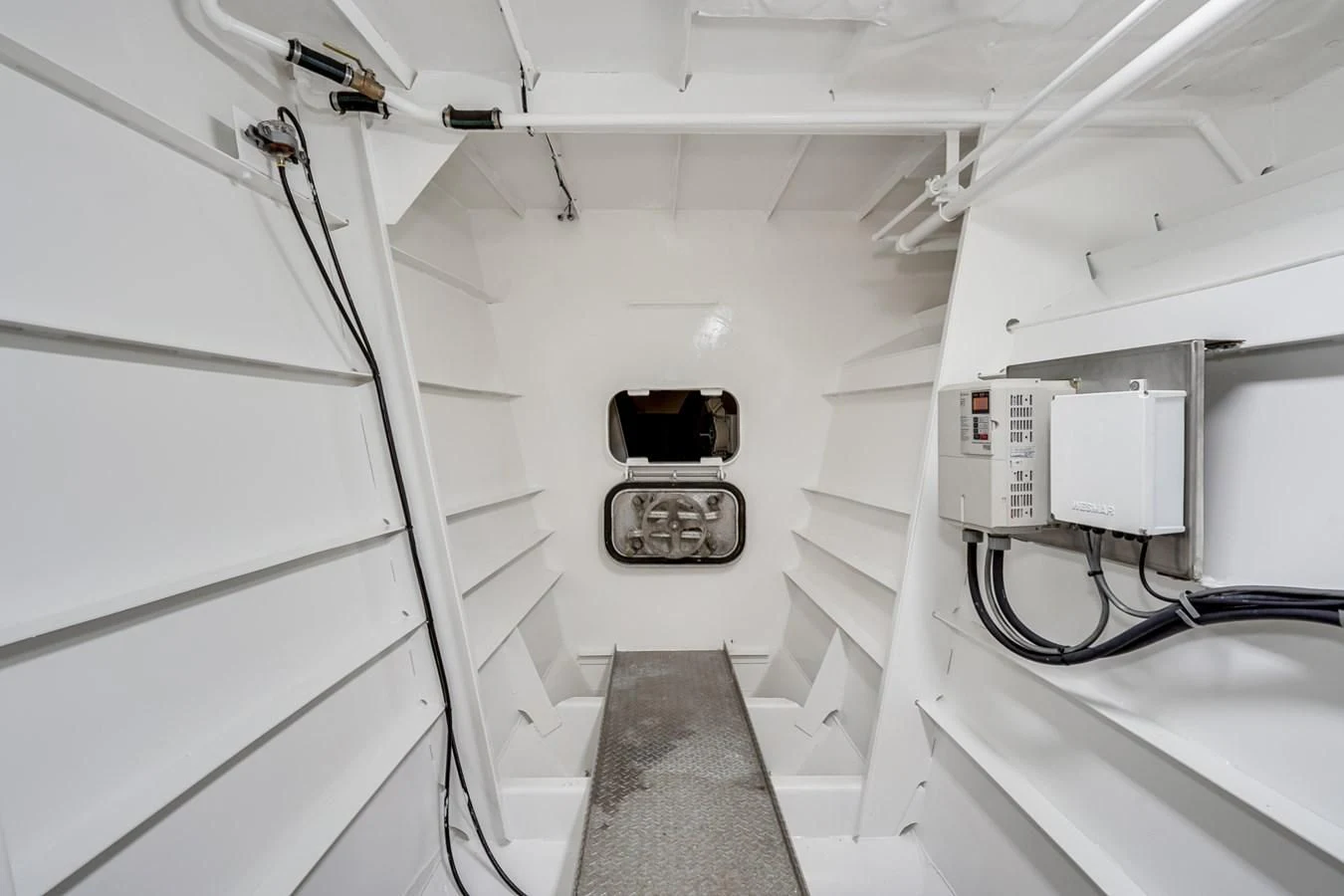 a white room with a vent aboard DRAGONFLY Yacht for Sale