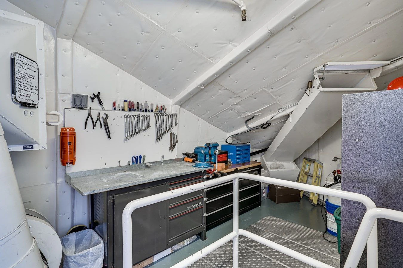 a room with a machine aboard DRAGONFLY Yacht for Sale