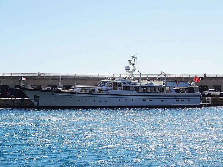 a large boat in the water aboard LELOU Yacht for Sale