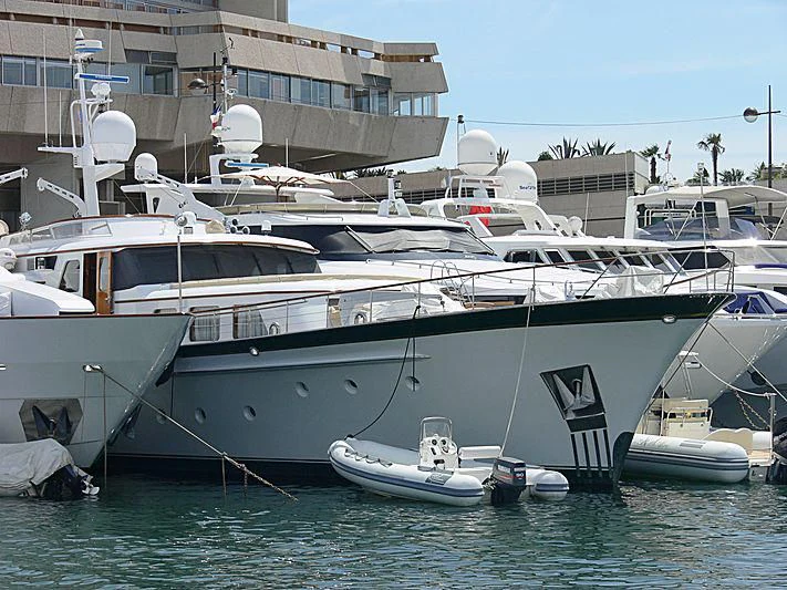 a group of boats in a harbor aboard LELOU Yacht for Sale