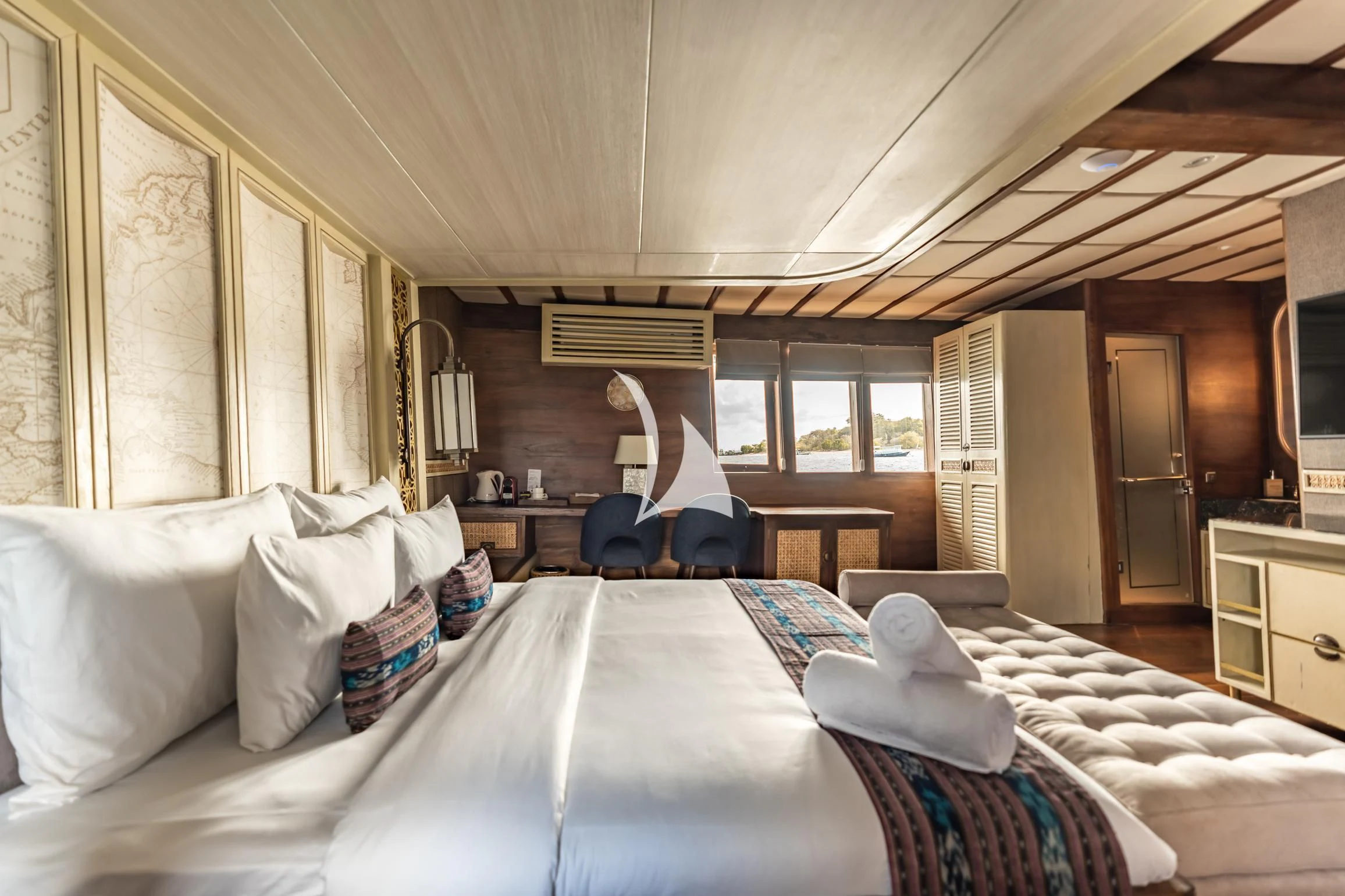 a person lying on a bed aboard THE MAJ OCEANIC Yacht for Charter