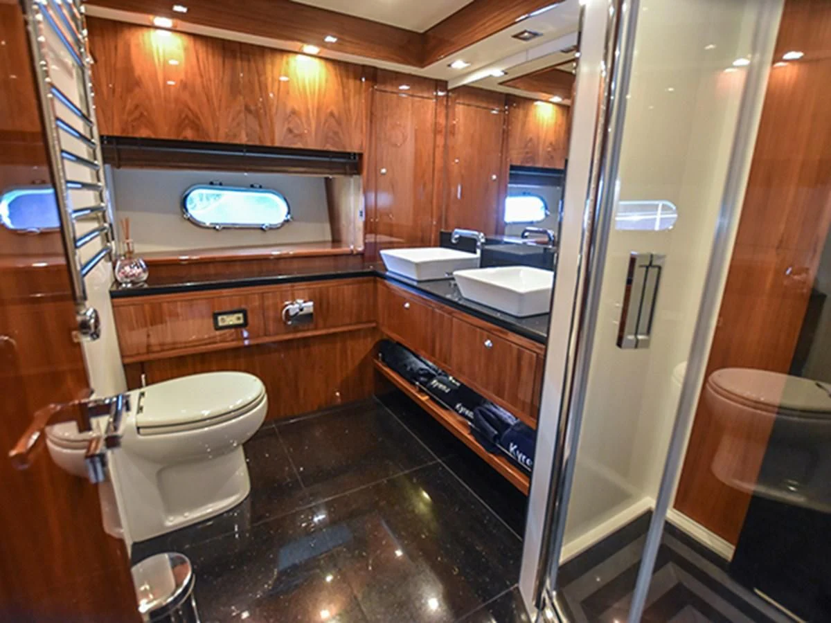 a bathroom with a toilet and sink aboard KYRENIA Yacht for Sale