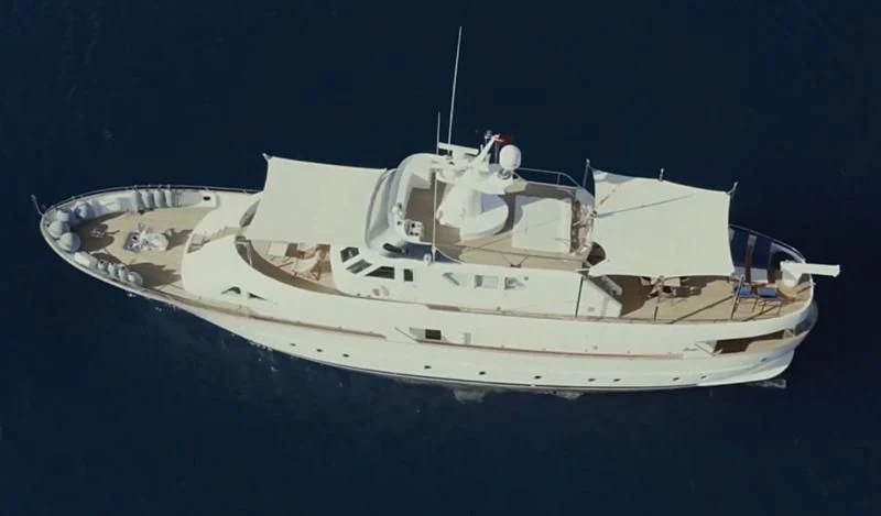 a white yacht in the water aboard VIKA Yacht for Sale