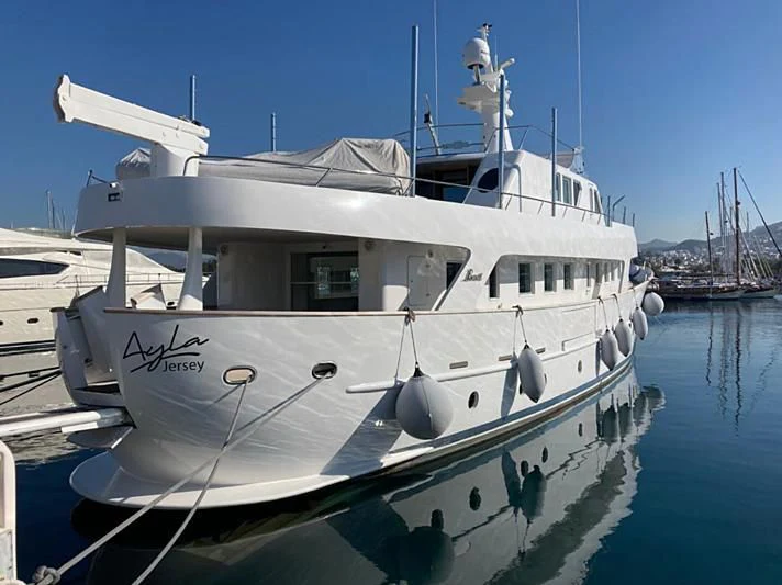 a white boat in the water aboard VIKA Yacht for Sale