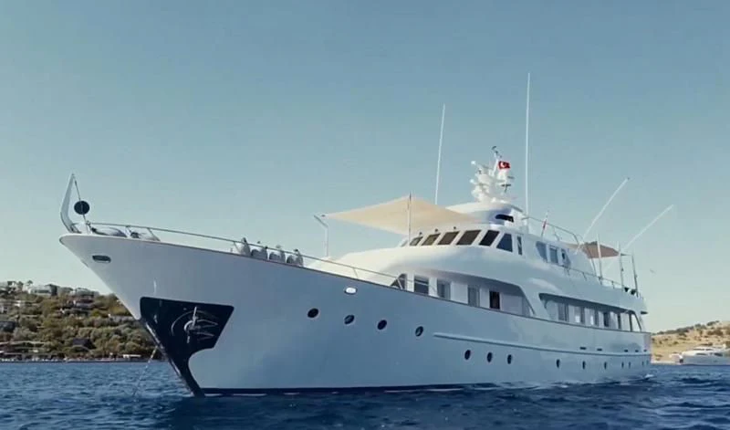 a large white ship aboard VIKA Yacht for Sale