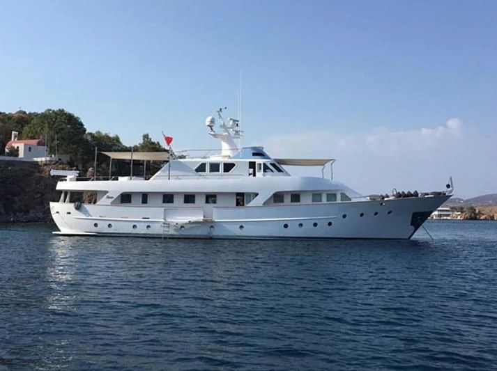 a white boat in the water aboard VIKA Yacht for Sale