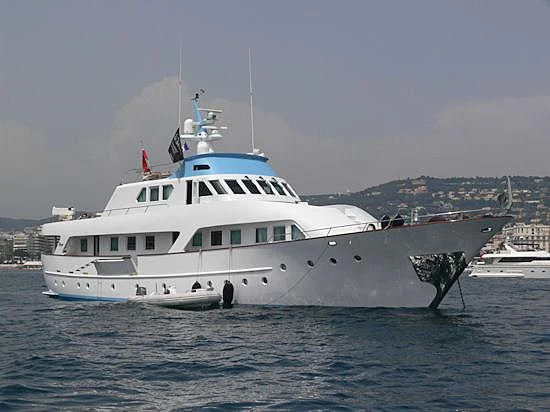 a large white boat in the water aboard VIKA Yacht for Sale