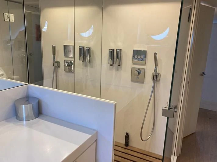 a bathroom with a bathtub and sink aboard VIKA Yacht for Sale