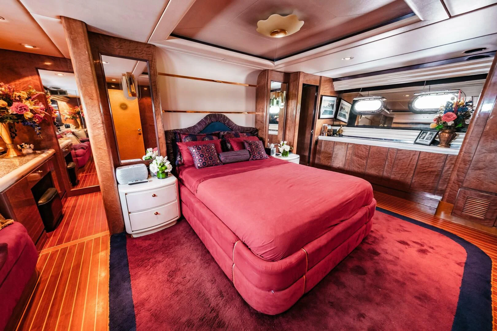 a bedroom with a large bed aboard LADY GERTS Yacht for Sale