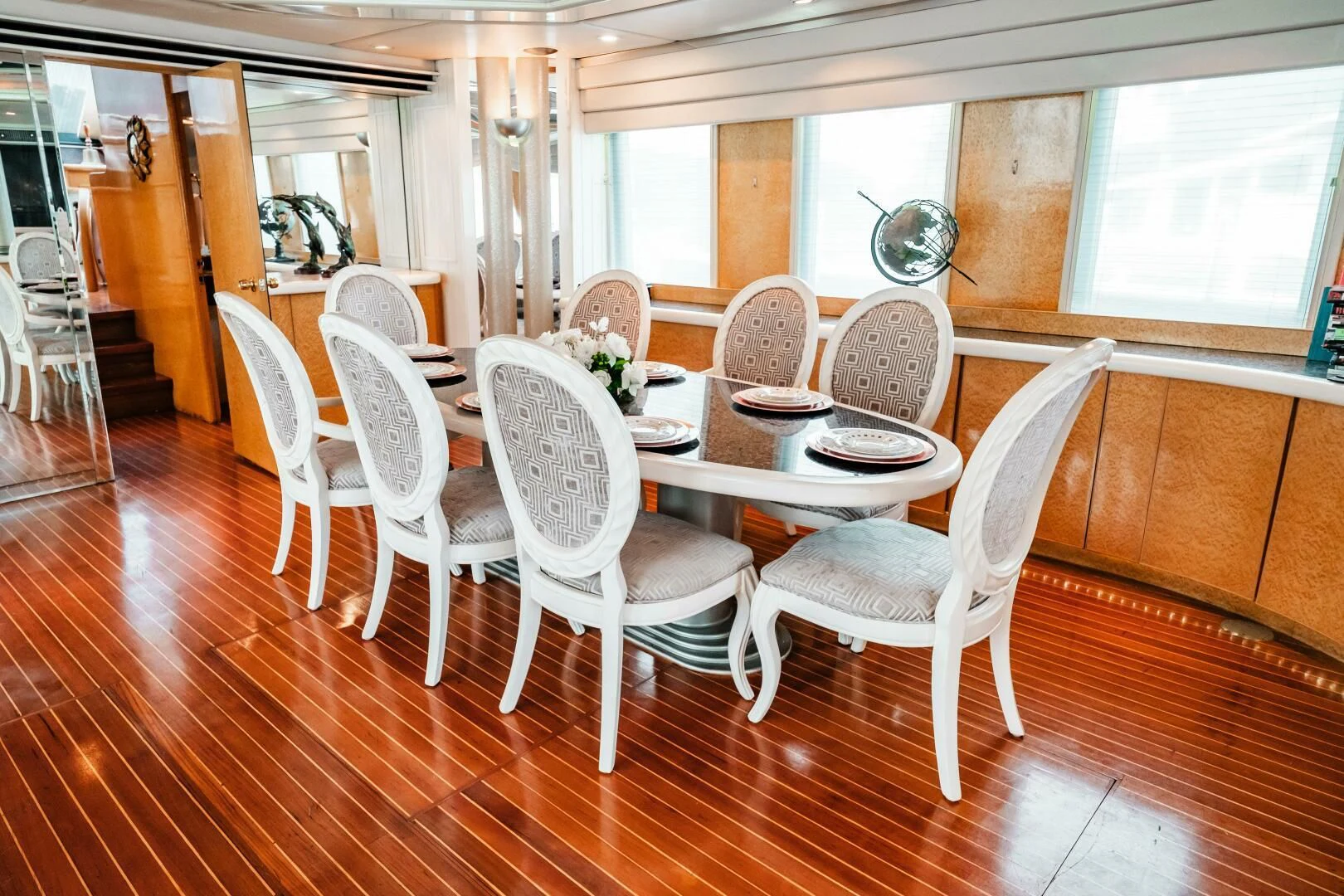 a dining room with chairs aboard LADY GERTS Yacht for Sale