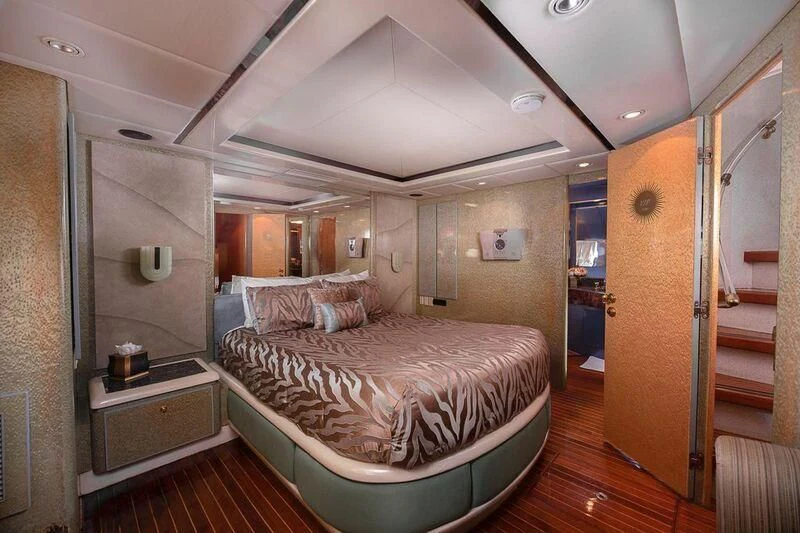 a bedroom with a bed aboard LADY GERTS Yacht for Sale