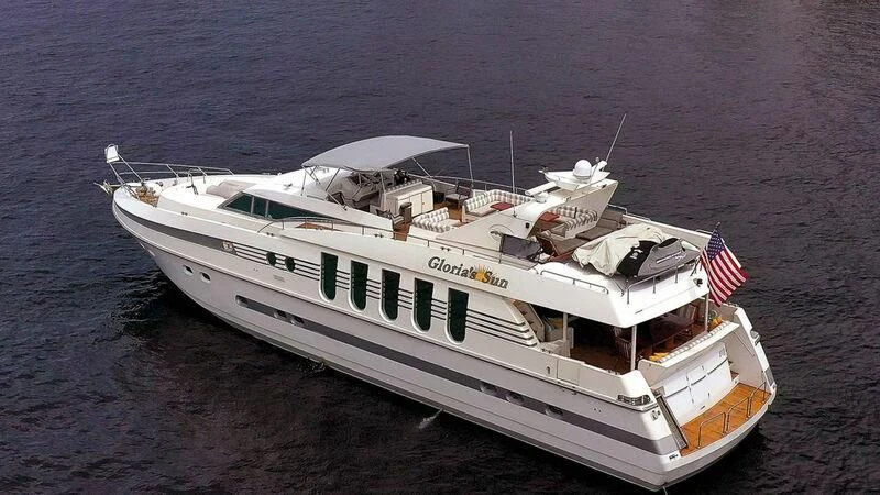 a large white yacht on the water aboard LADY GERTS Yacht for Sale