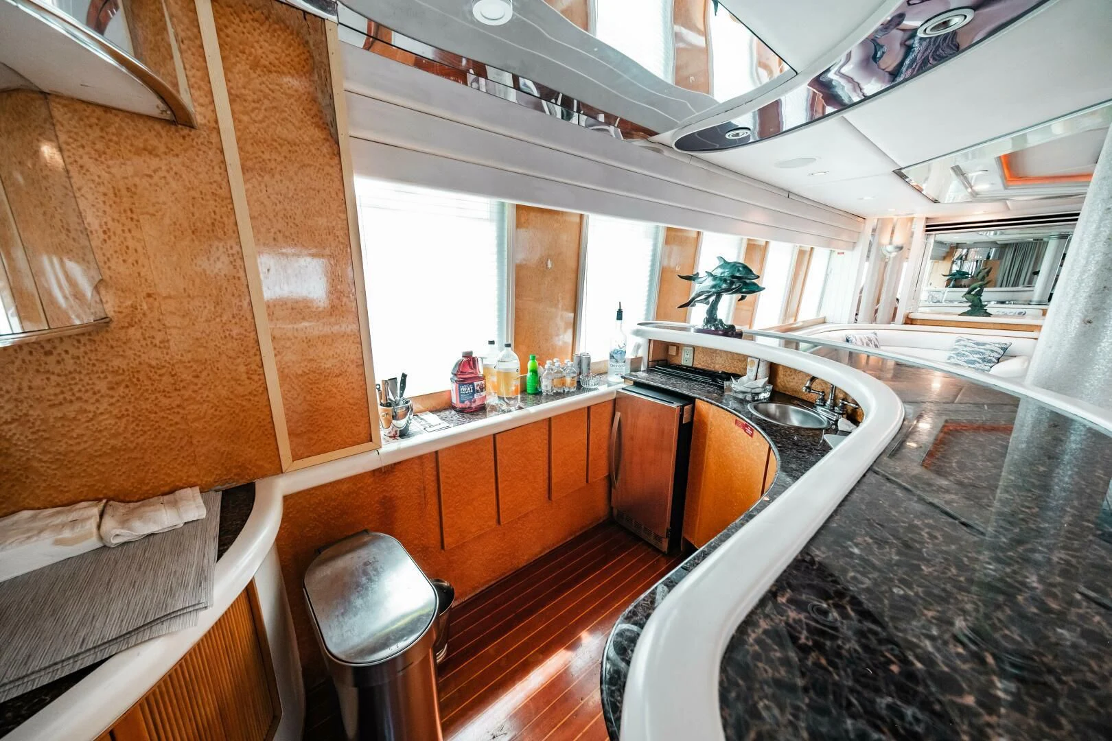 a kitchen with a large window aboard LADY GERTS Yacht for Sale