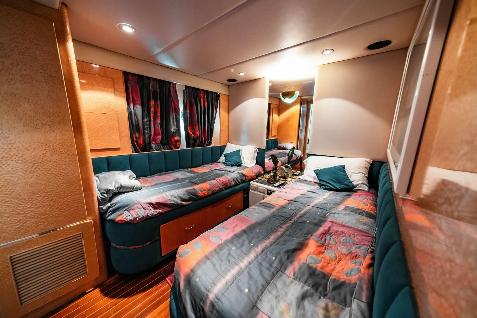 a room with beds and a closet aboard LADY GERTS Yacht for Sale