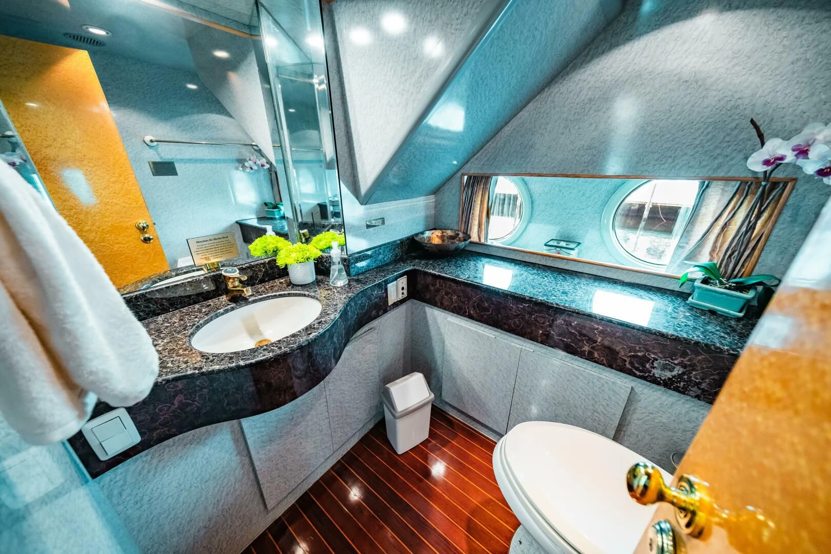 a bathroom with a large marble countertop aboard LADY GERTS Yacht for Sale
