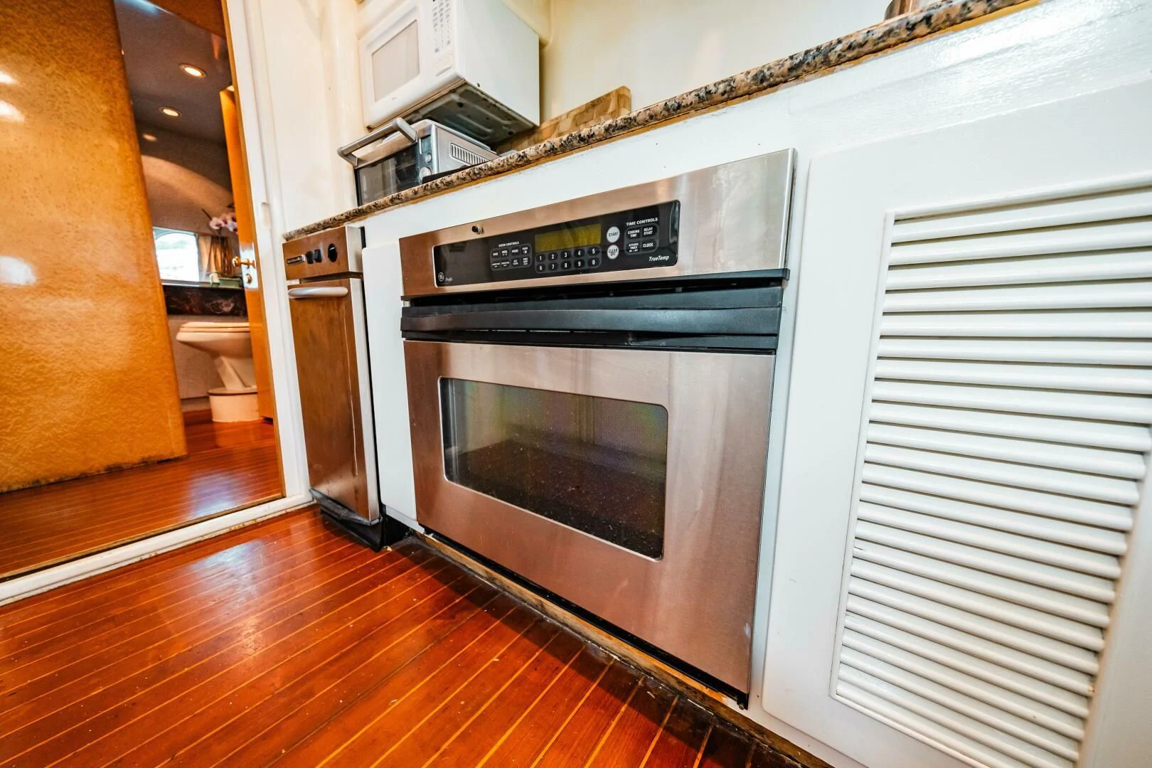 a microwave oven in a kitchen aboard LADY GERTS Yacht for Sale
