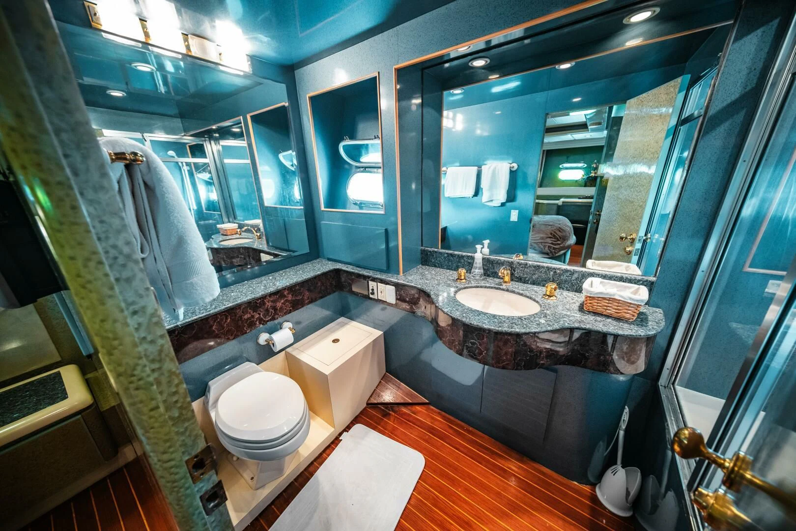 a bathroom with a large mirror aboard LADY GERTS Yacht for Sale