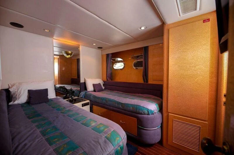 a room with two beds aboard LADY GERTS Yacht for Sale