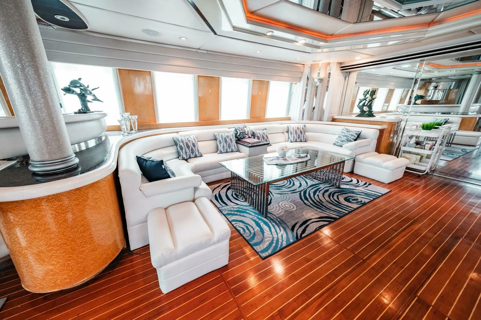a living room with a large rug aboard LADY GERTS Yacht for Sale