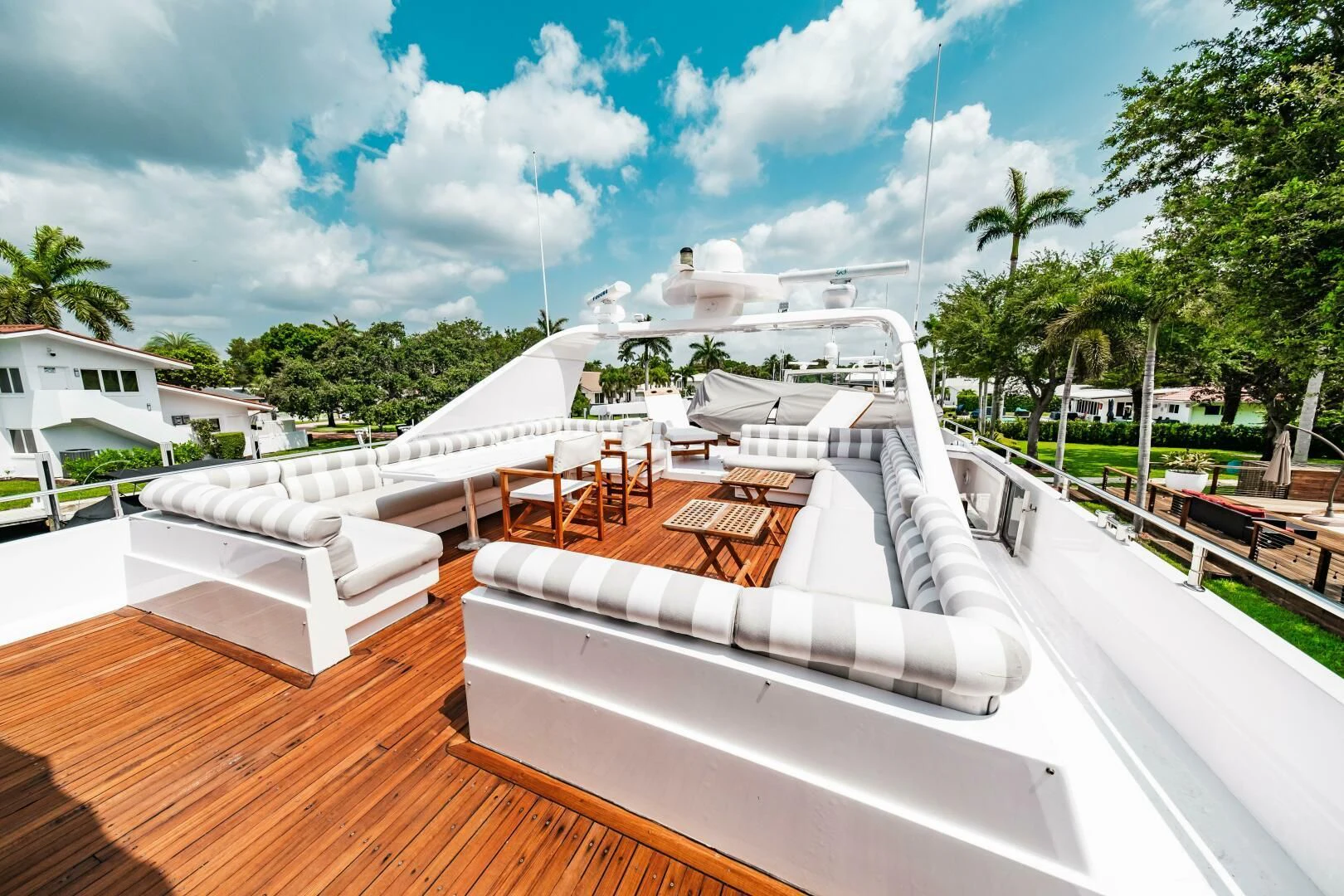 a deck with a large white boat on it aboard LADY GERTS Yacht for Sale