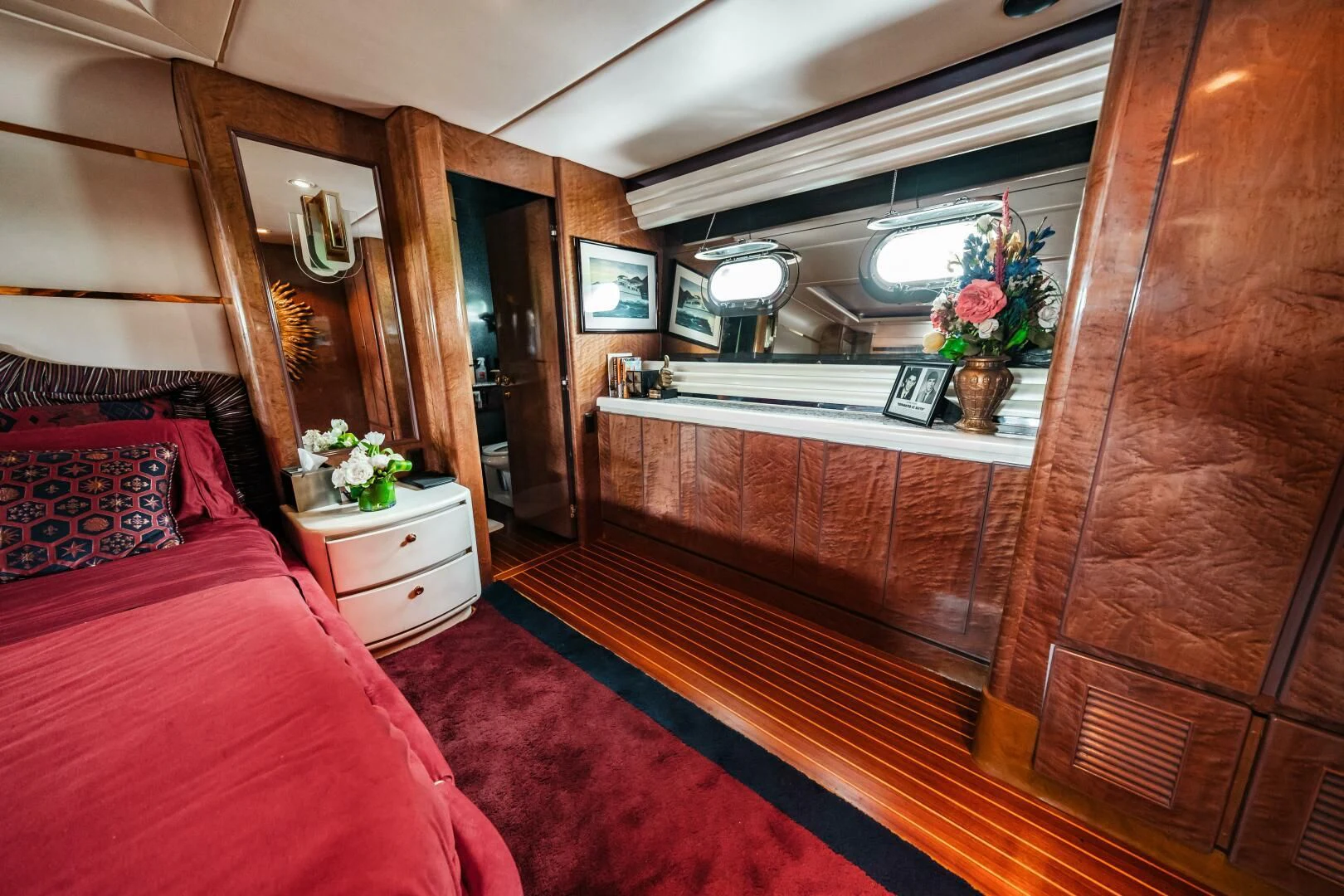 a room with a bed and a desk aboard LADY GERTS Yacht for Sale