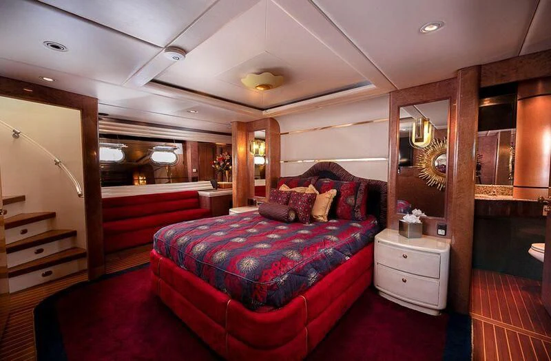 a bed in a room aboard LADY GERTS Yacht for Sale