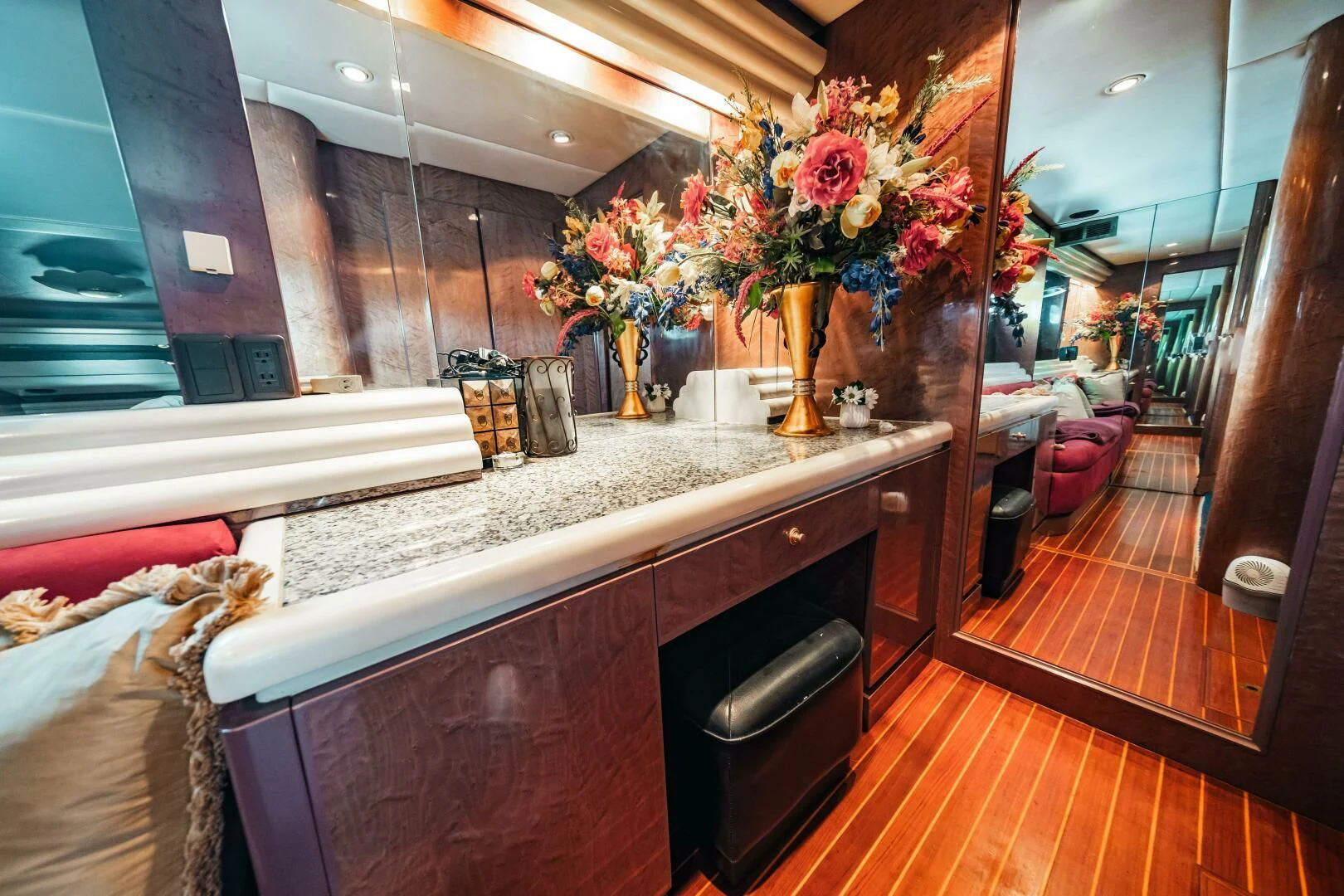 a kitchen with a counter and chairs aboard LADY GERTS Yacht for Sale